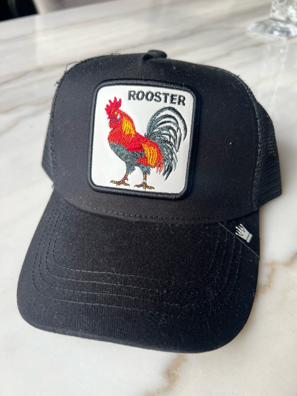 Goorin Bros Black Rooster Patch Trucker Hat with Red and Yellow Embroidery